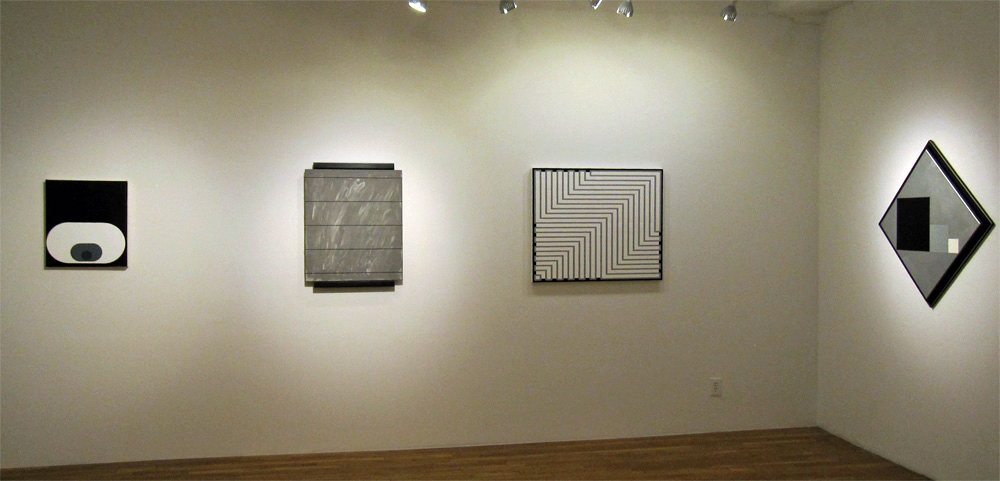 installation view of four paintings along two walls at Beyond Black and White, Westbeth Gallery